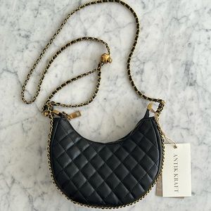 Quilted black cross body chain strap bag